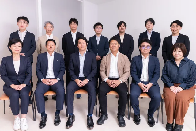 Group photo of the members at the Kawasaki office.